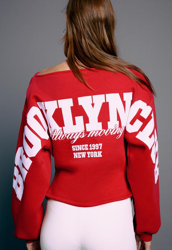 sweat ajuste asymetrique a imprime