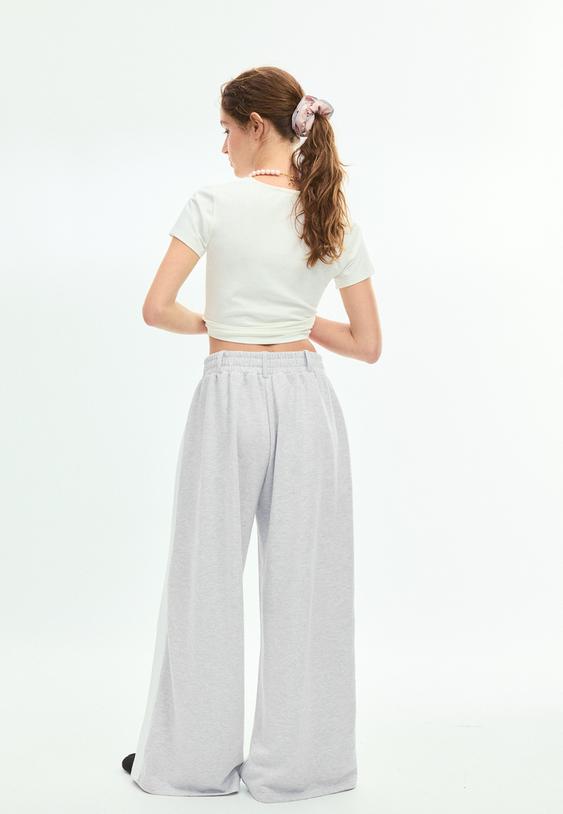 pantalon wide leg felpa banda lateral
