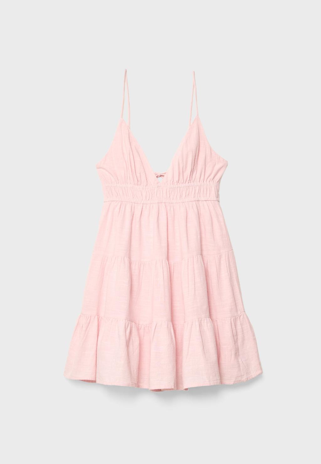 Short flowing dress with tied detail at the back