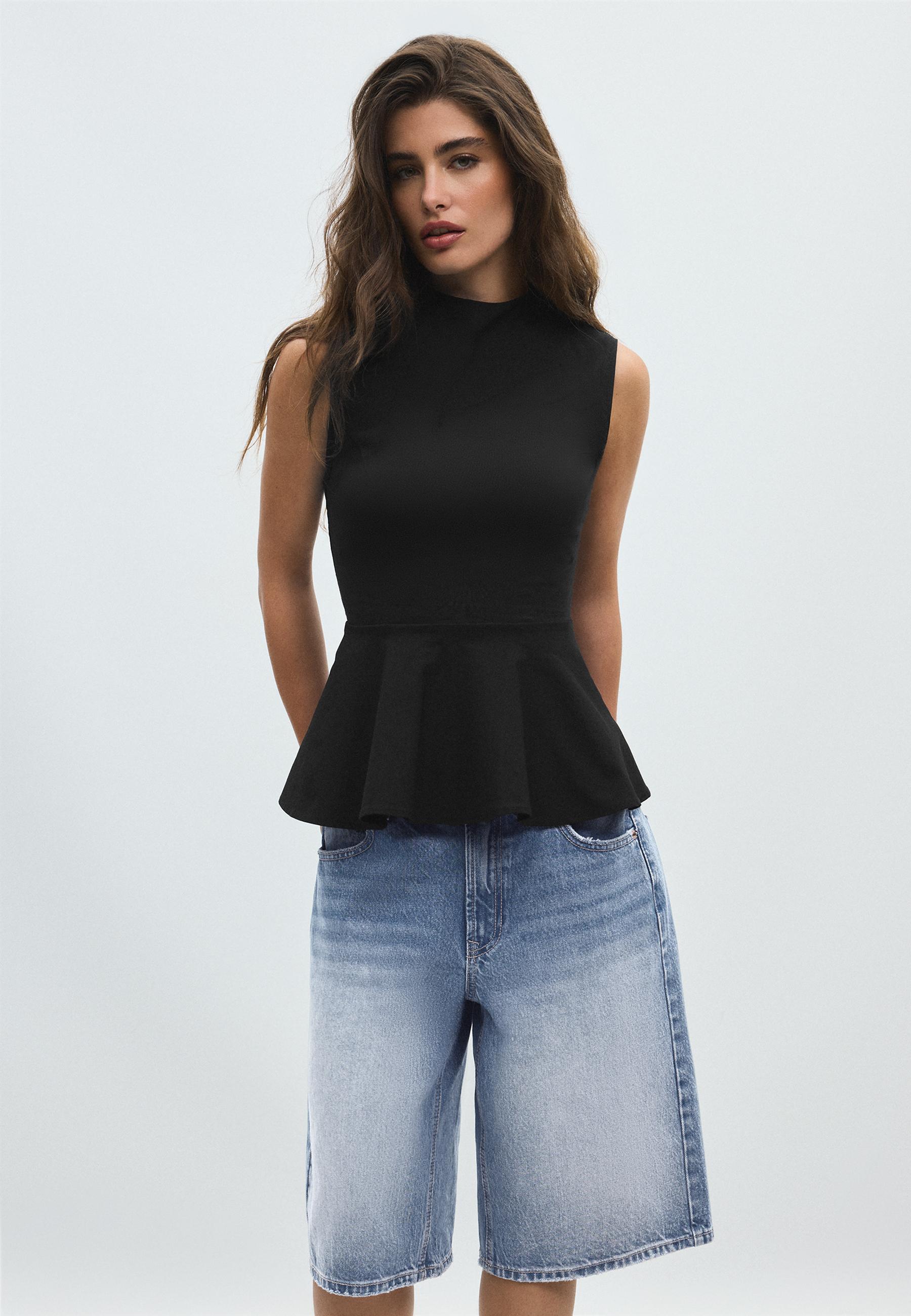 Sleeveless high-neck peplum top — Black