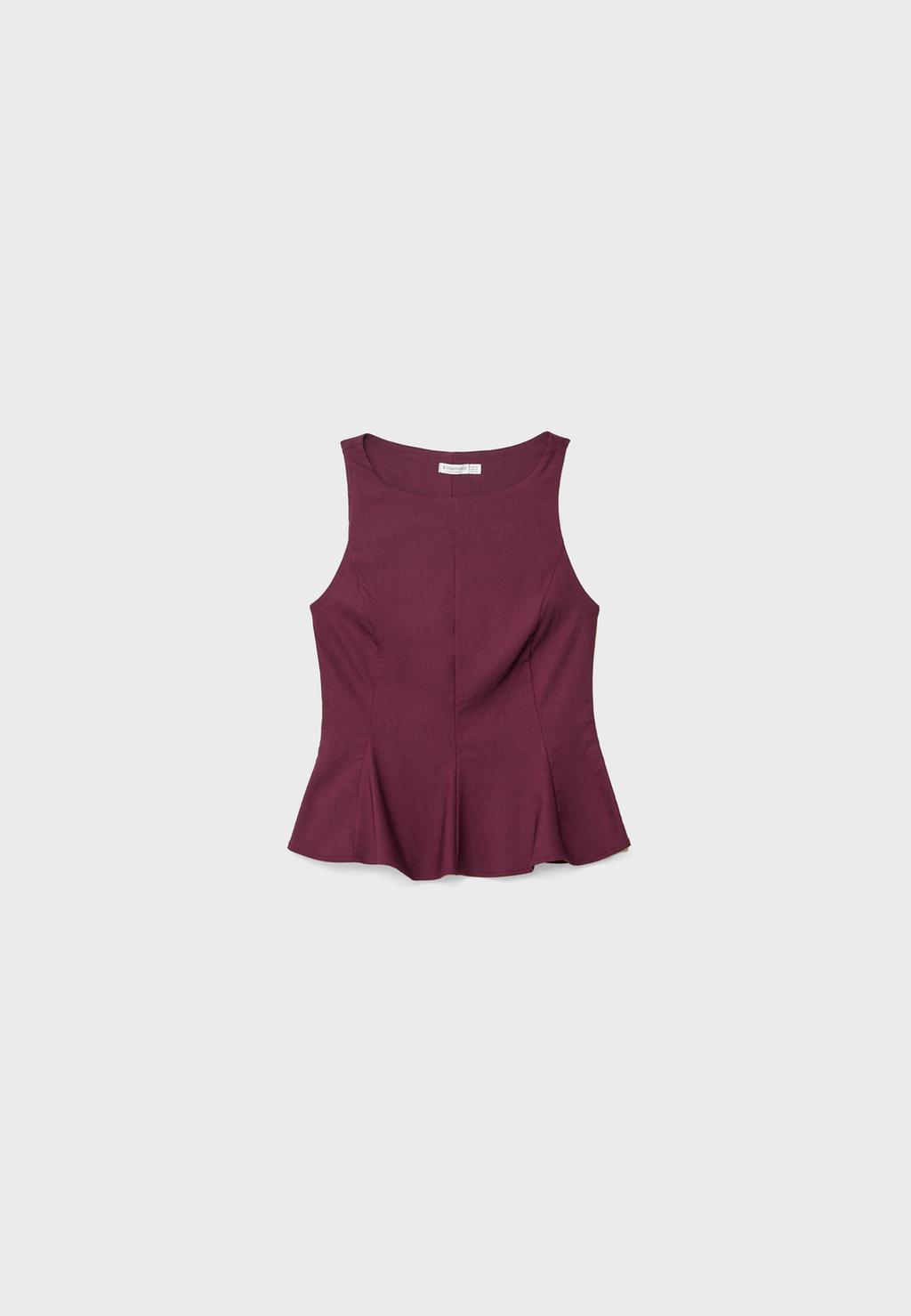 Sleeveless peplum top