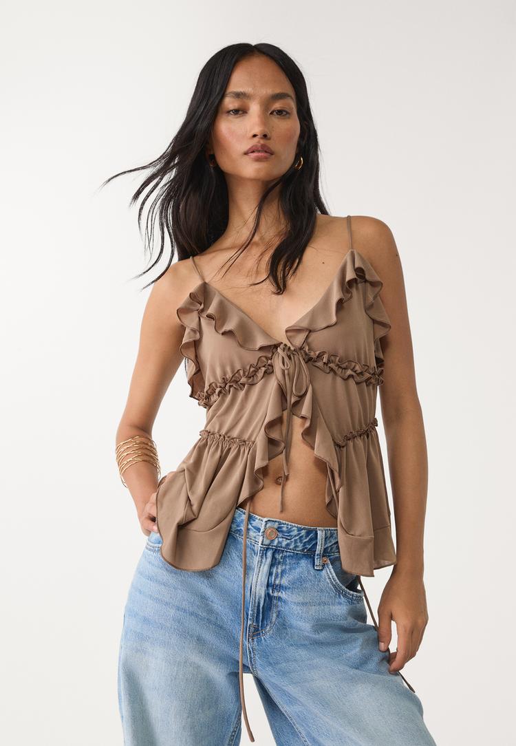 top met bandjes en volants