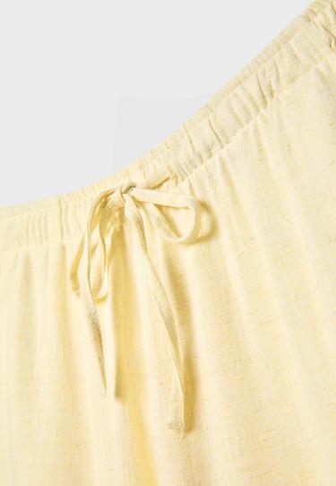 Flowing linen-effect trousers — Pastel yellow 9