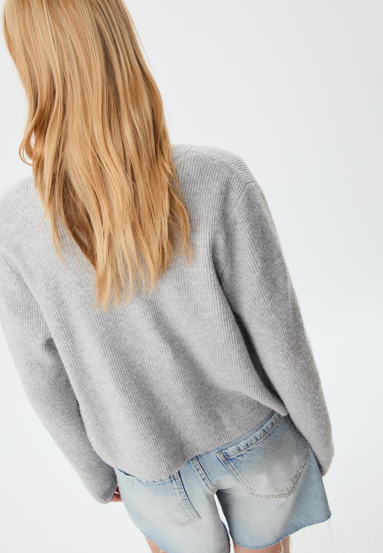 chaqueta punto rib botones