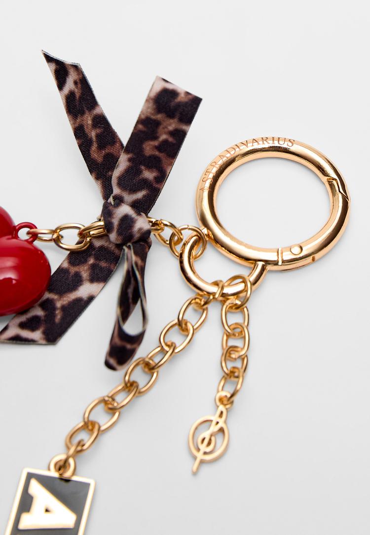 Stradivarius Μπρελόκ Καρδιά Και Φιόγκος Χρυσαφί Os φωτογραφία