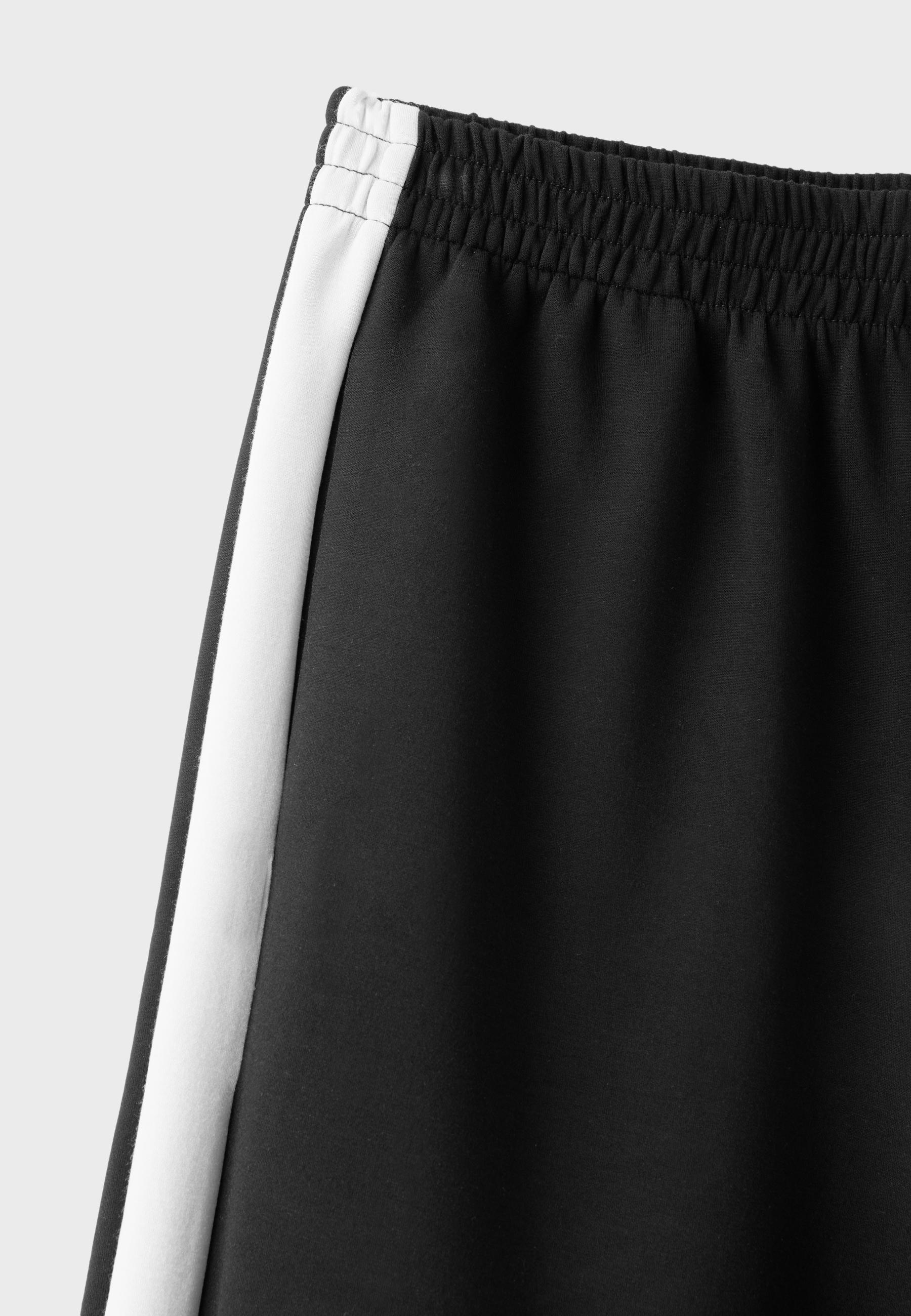Soft-touch wide-leg jogger trousers with side band — Black