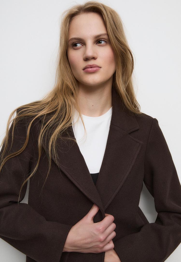 abrigo midi boton tacto suave