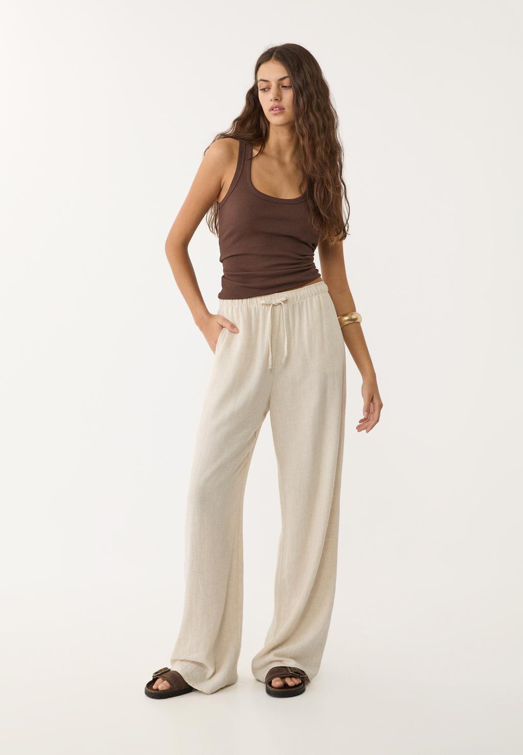 Loose-fitting linen blend trousers