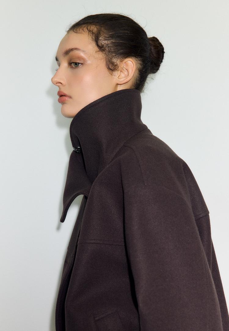 cazadora cruzada cuello alto tacto suave