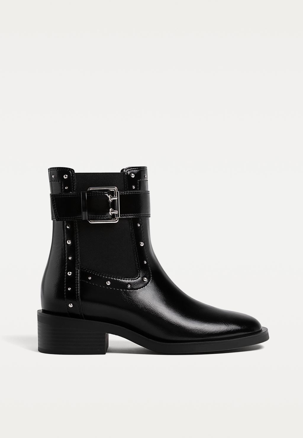 Flat studded ankle boots