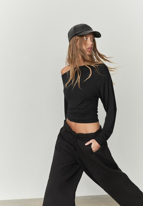 camisola de gola assimetrica