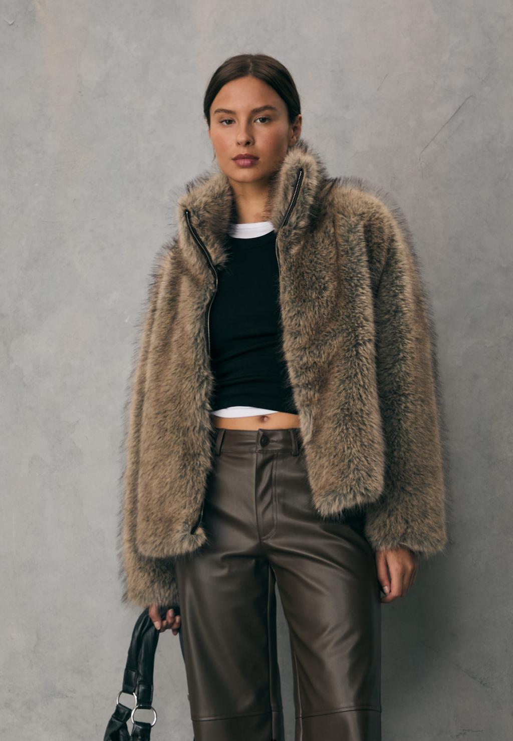 Blouson fausse fourrure col montant