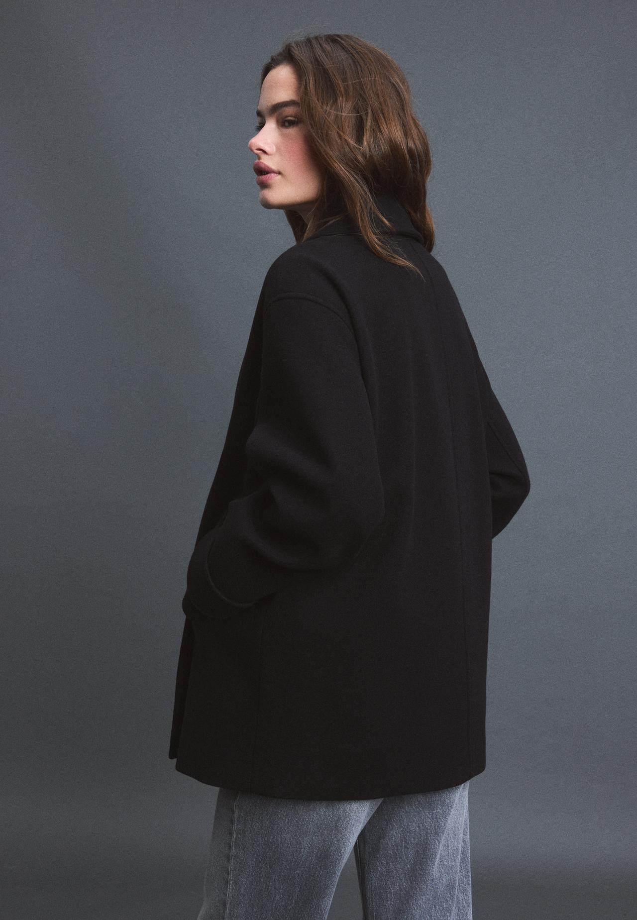 Soft-touch crossover high neck jacket — Black