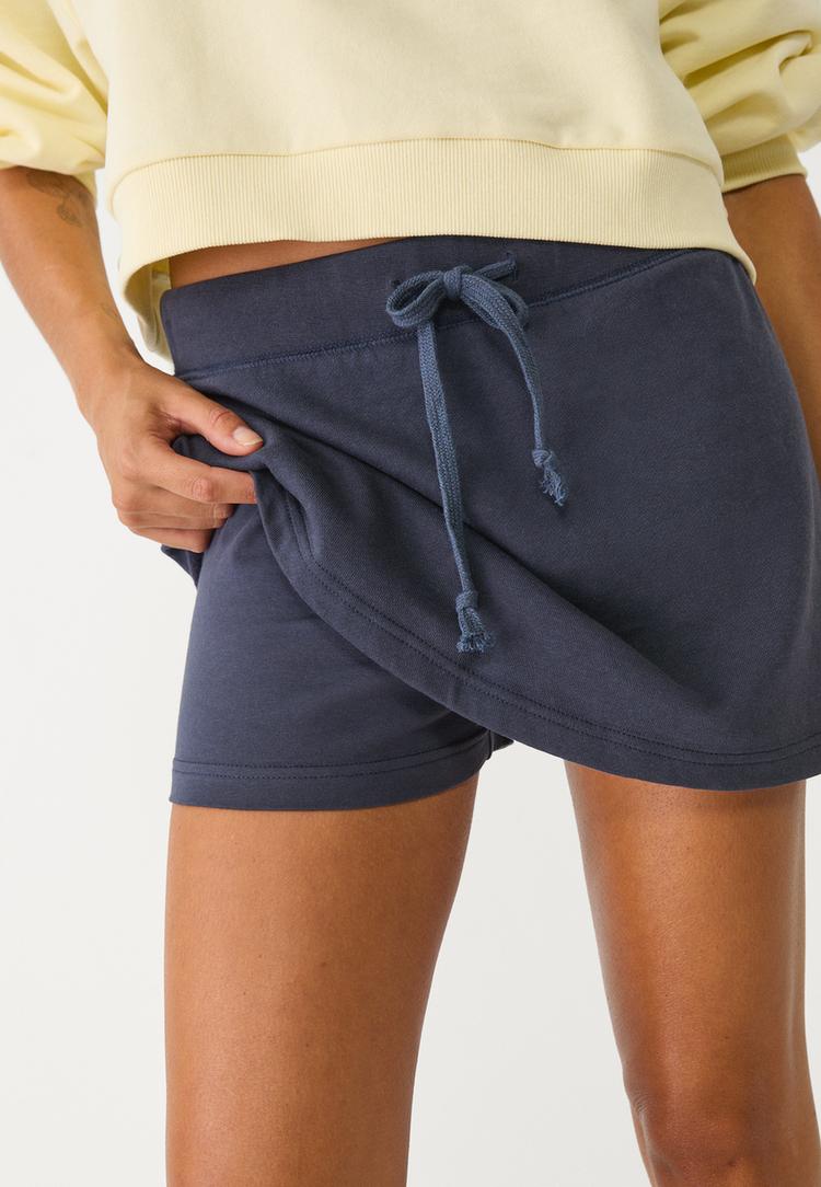 falda pantalon felpa cordones