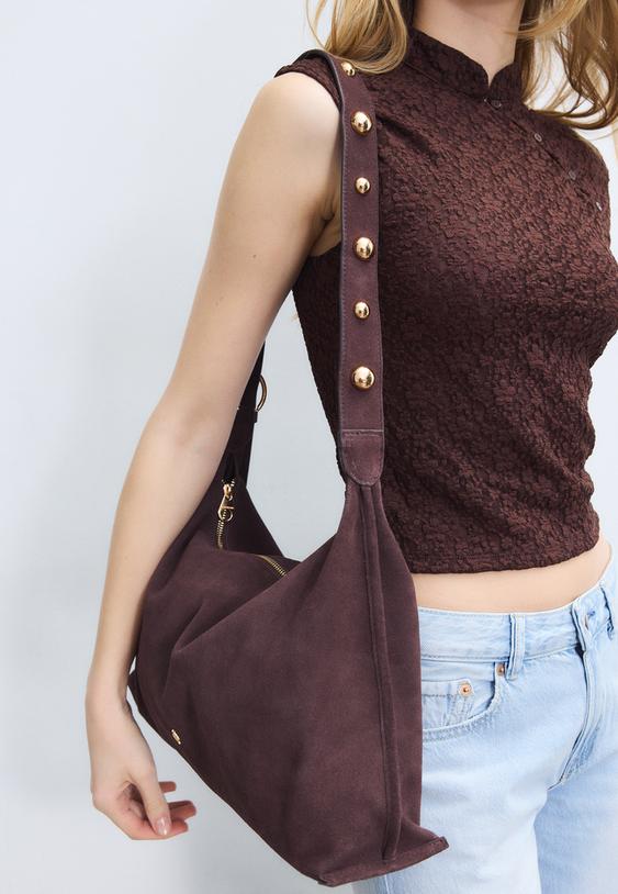 borsa a spalla piatta con borchie 100 pelle