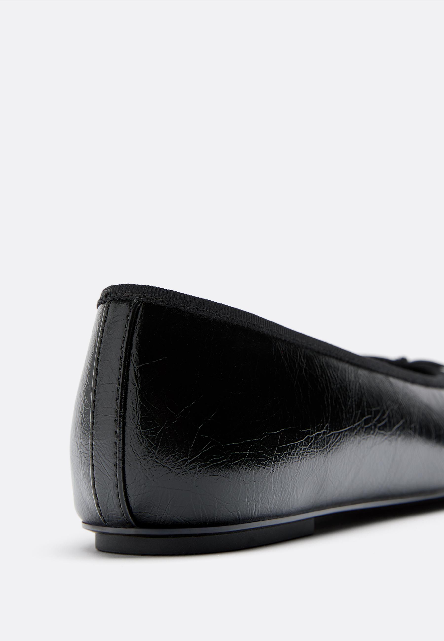 Bow detail leather effect ballet pumps — BLACK