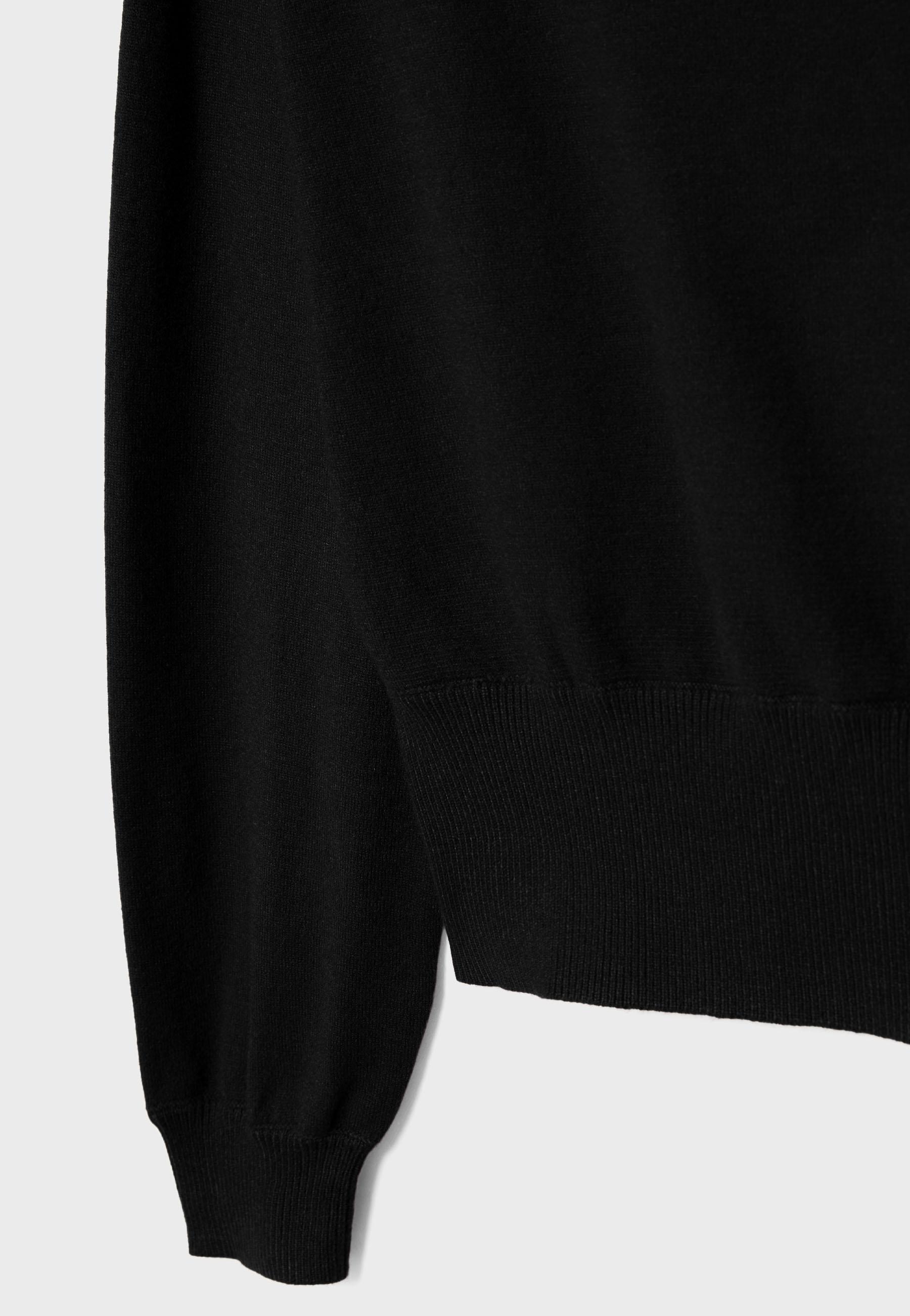 Asymmetric knit sweater — Black