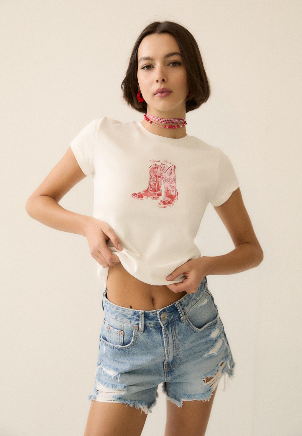 D75 Ripped denim shorts