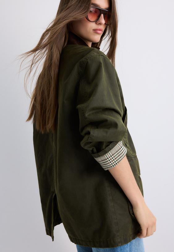 parka encerada multi bolsillos