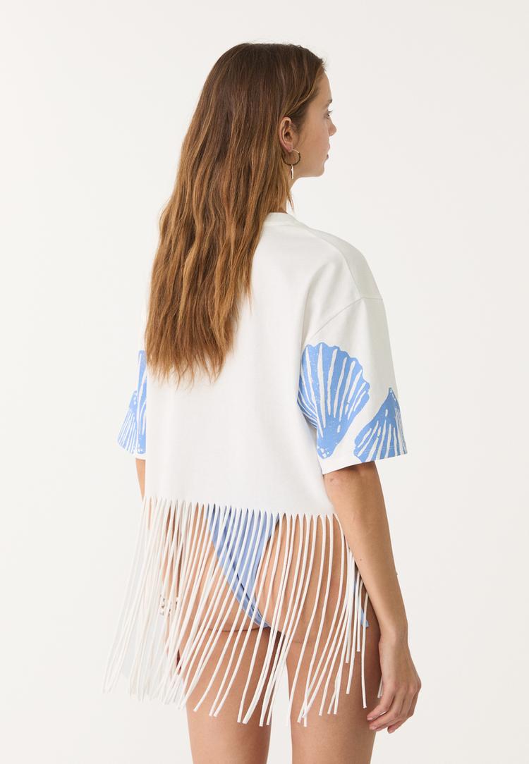 camiseta flecos conchas