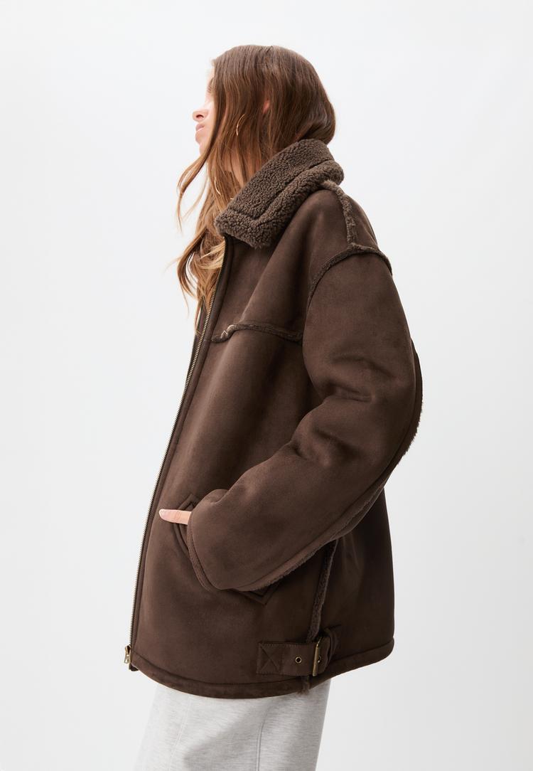 dubbelzijdige jas met stiksels