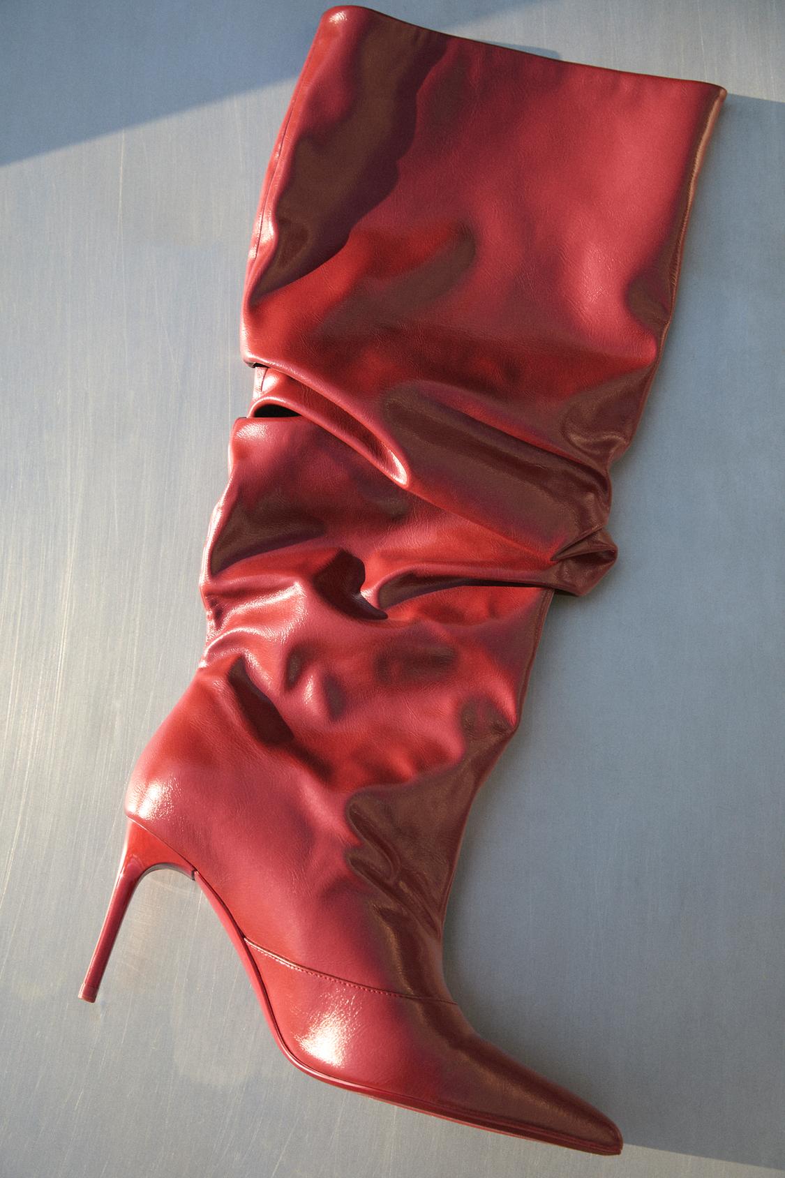 Slouchy high-heel knee-high boots