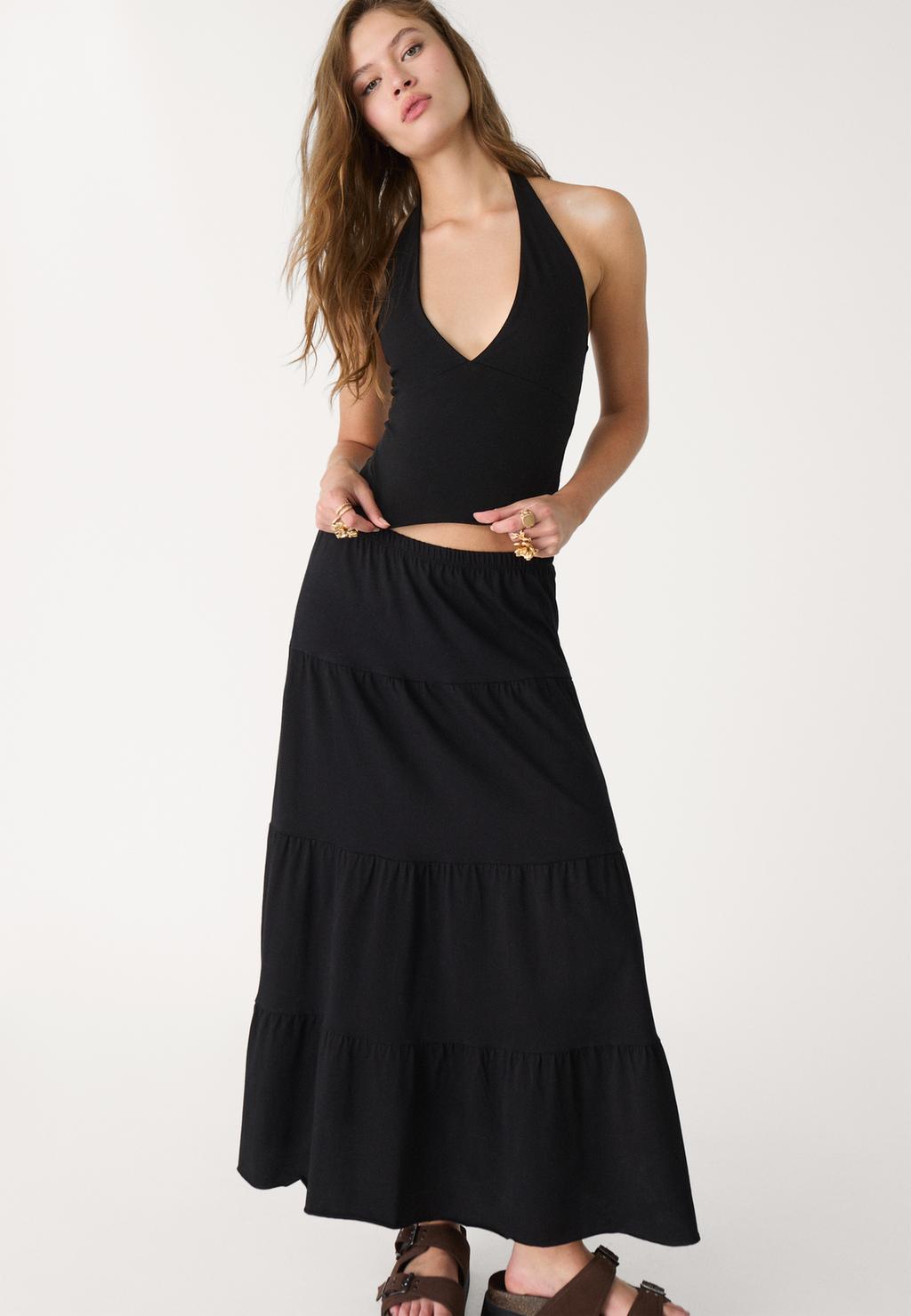 Top halter escote pico