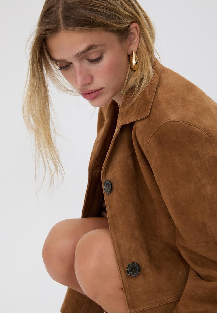 chaqueta bolsillos 100 piel