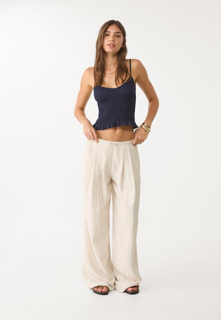 strappy top with elastic detail