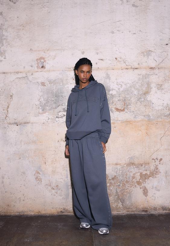 sudadera capucha bordado tachas