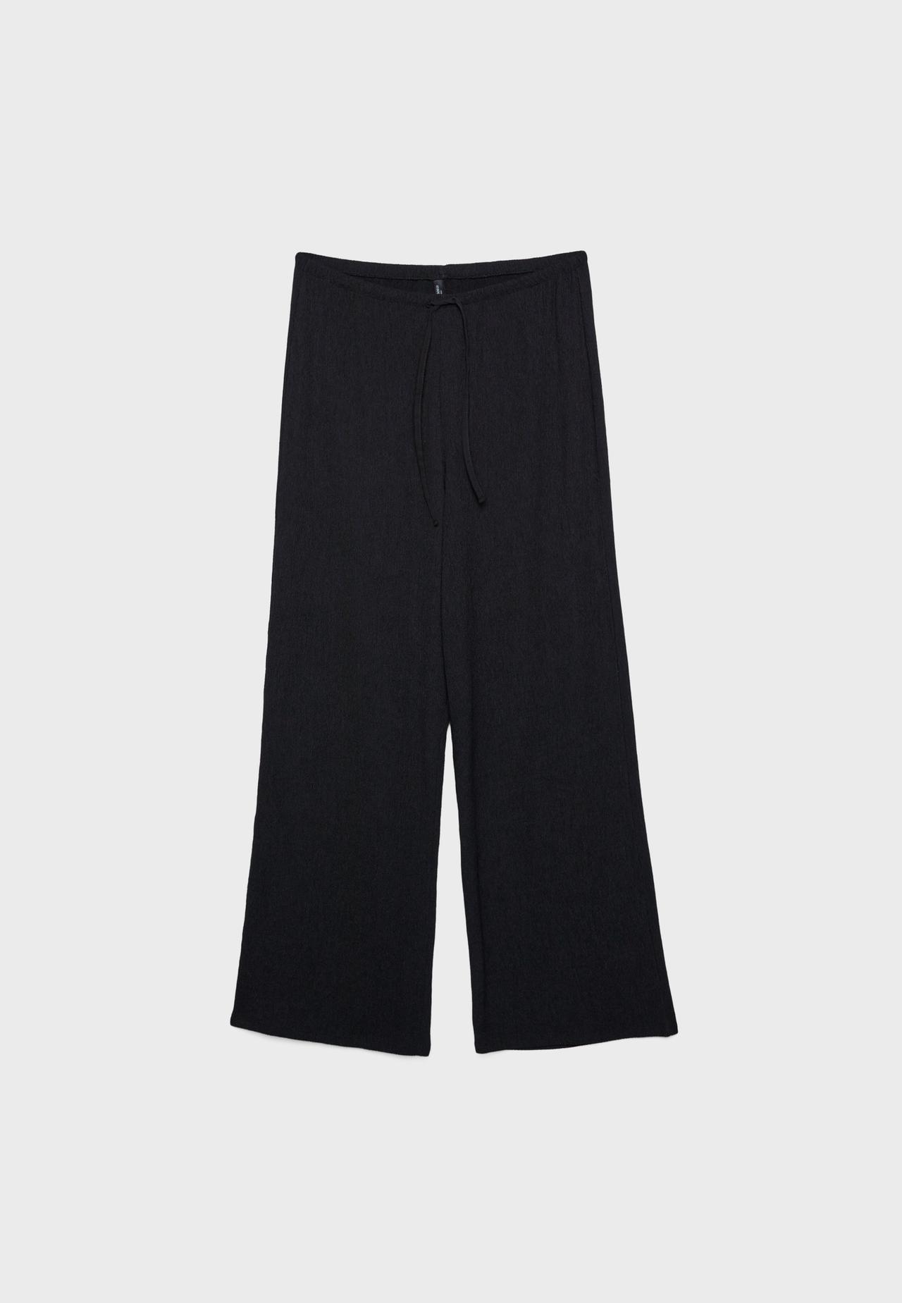 Creased-effect straight trousers — Black