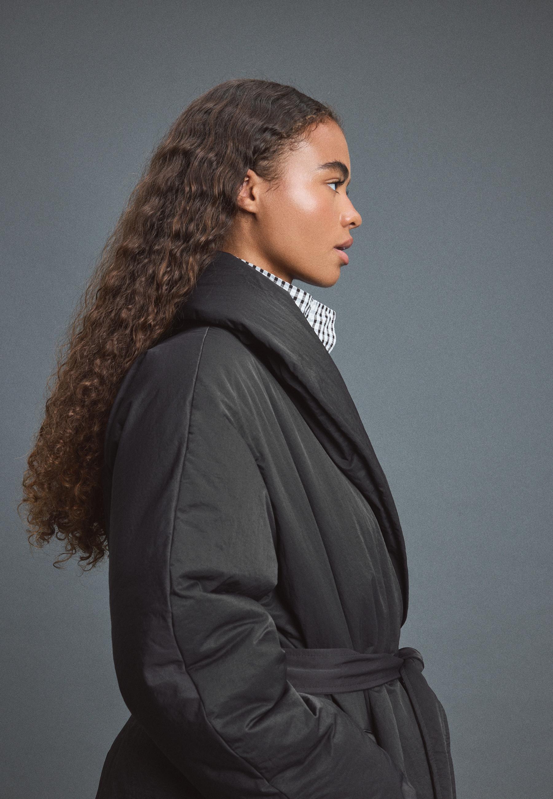 Padded jacket with shawl neck and belt — Black