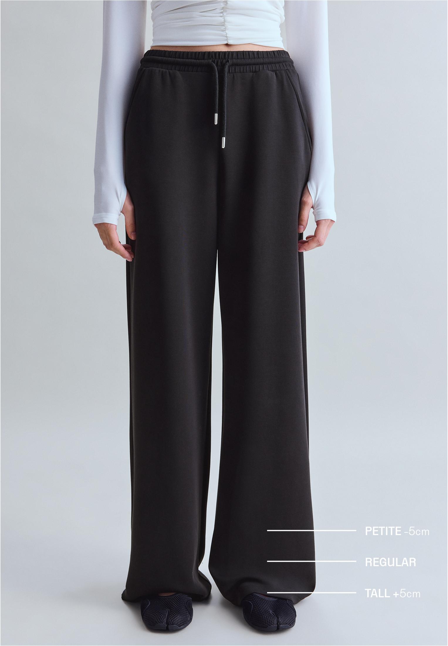 Soft-touch palazzo joggers — Black