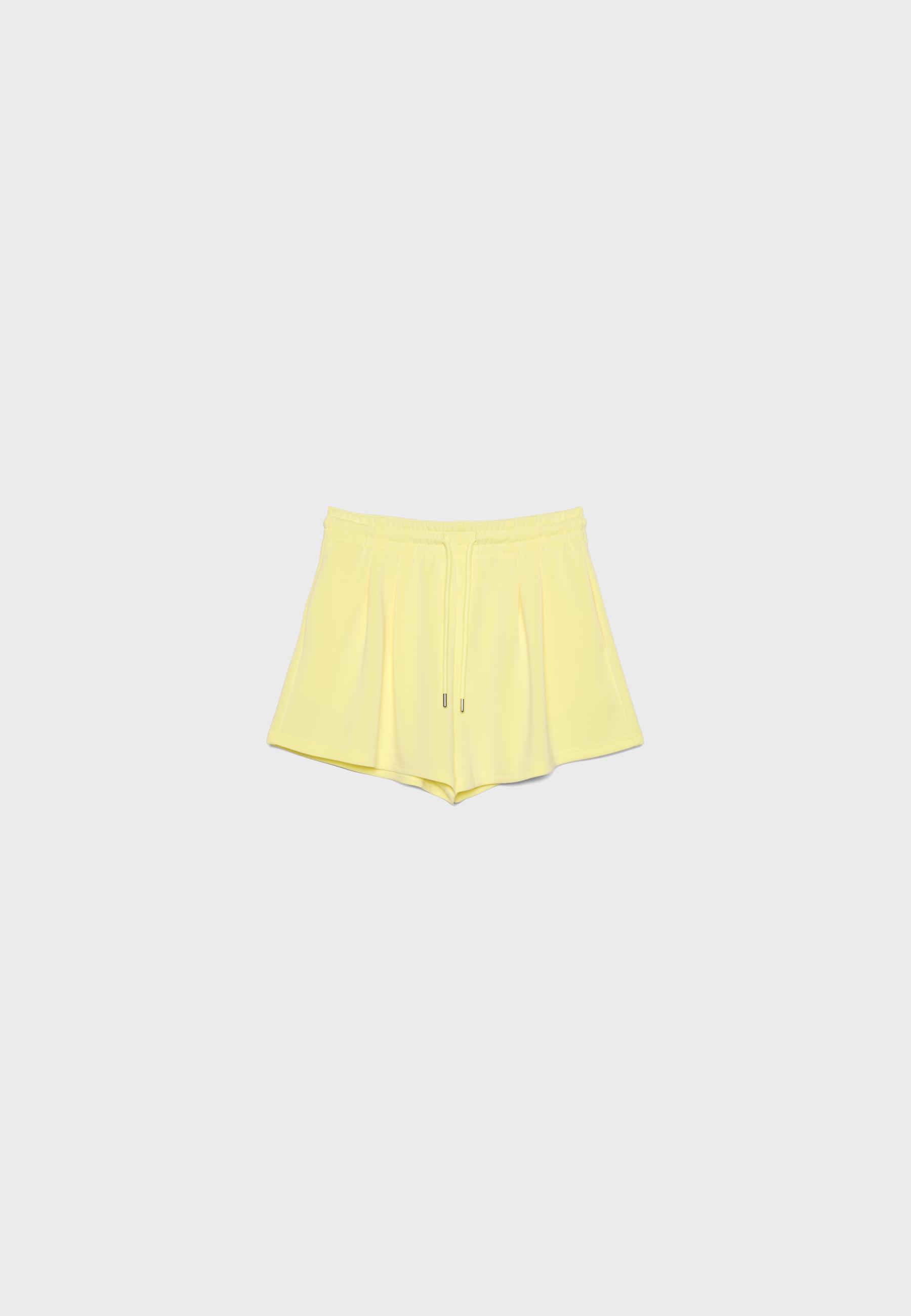 Soft-touch shorts with darts — Pastel yellow