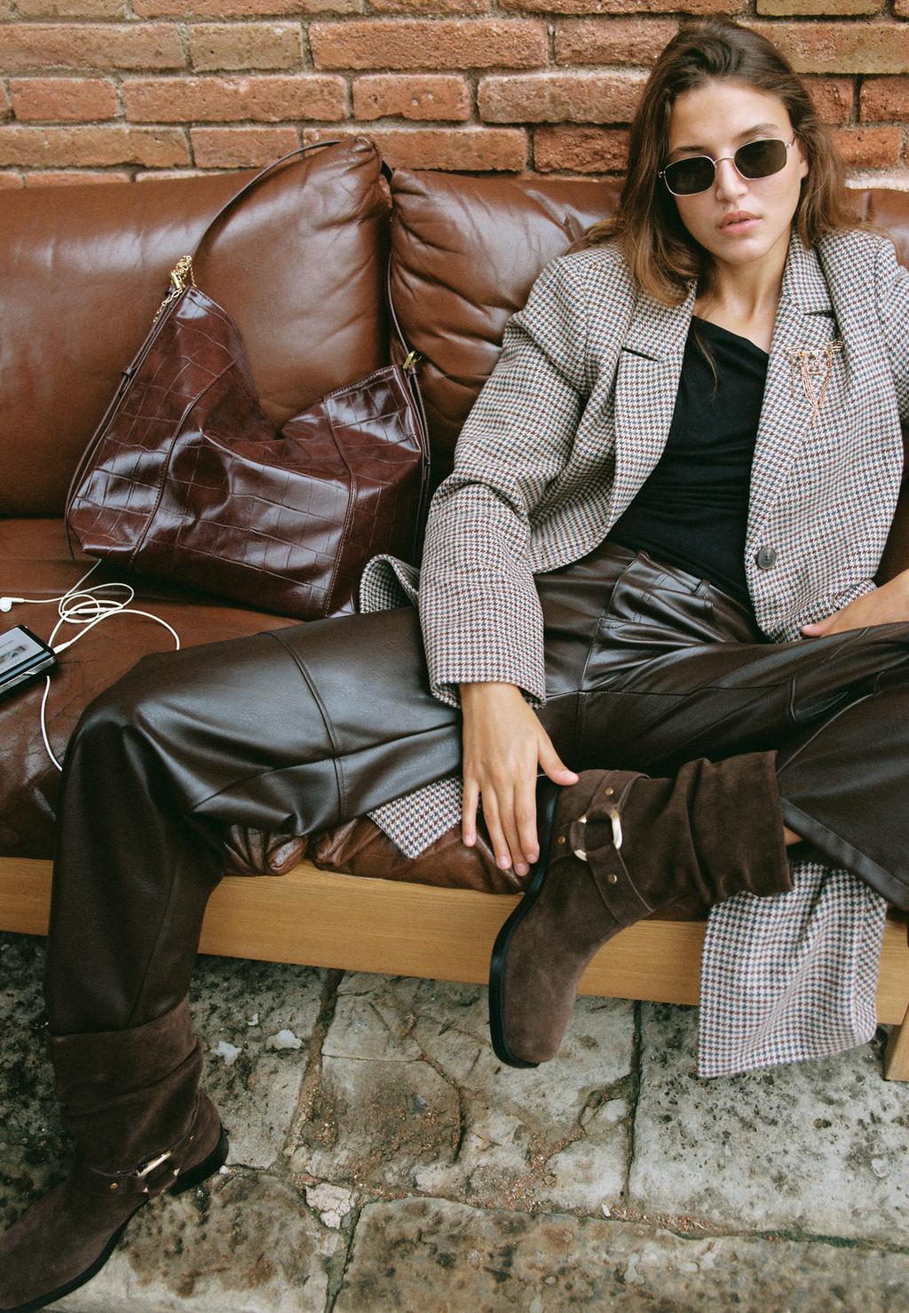 Flat leather ankle boots with buckle