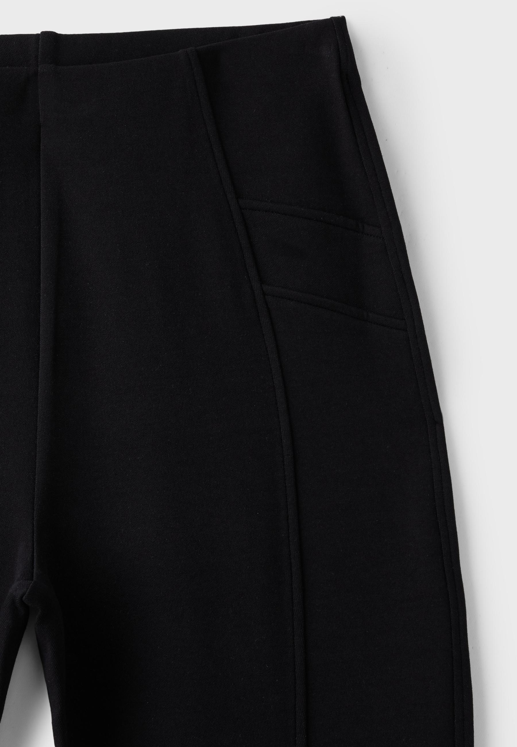 Cotton blend bell bottom leggings with seam detail — Black