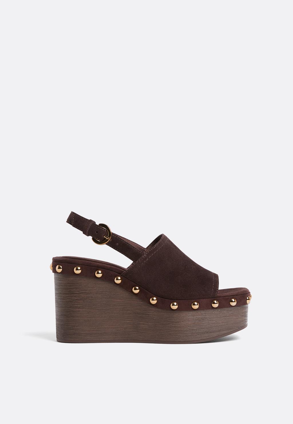 Zeppe con plateau e borchie in pelle