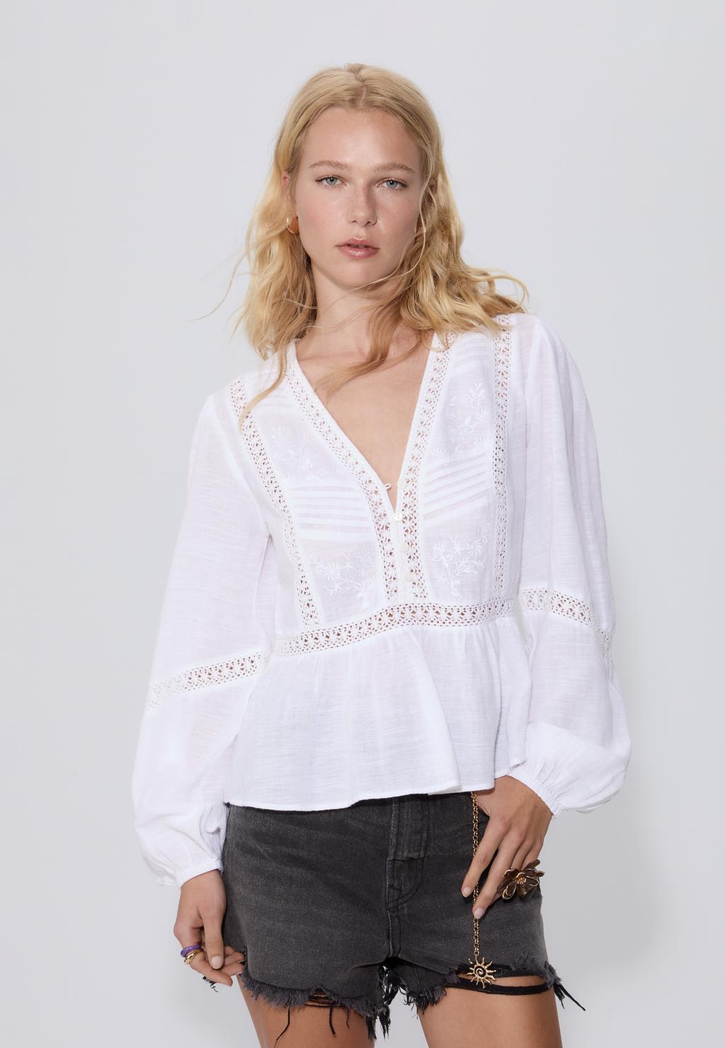 Blusa fluida bordados