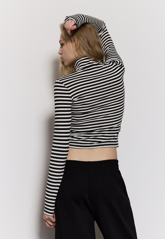 camiseta cremallera doble