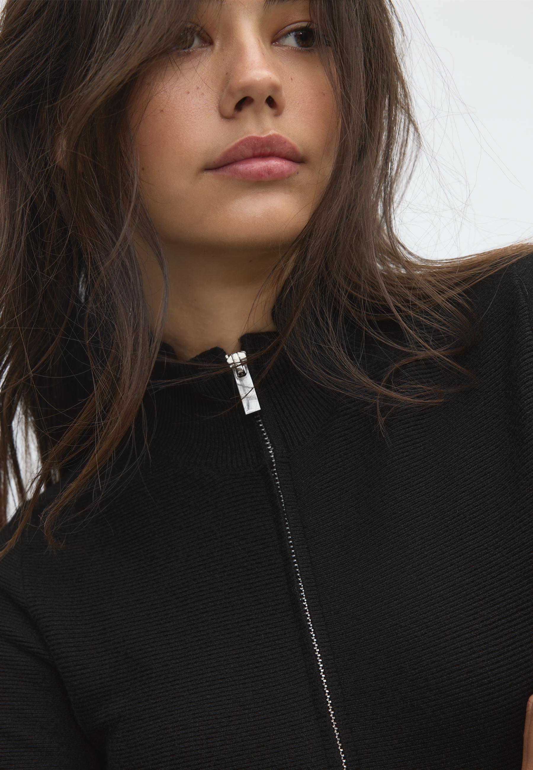 Peplum knit sweater — Black