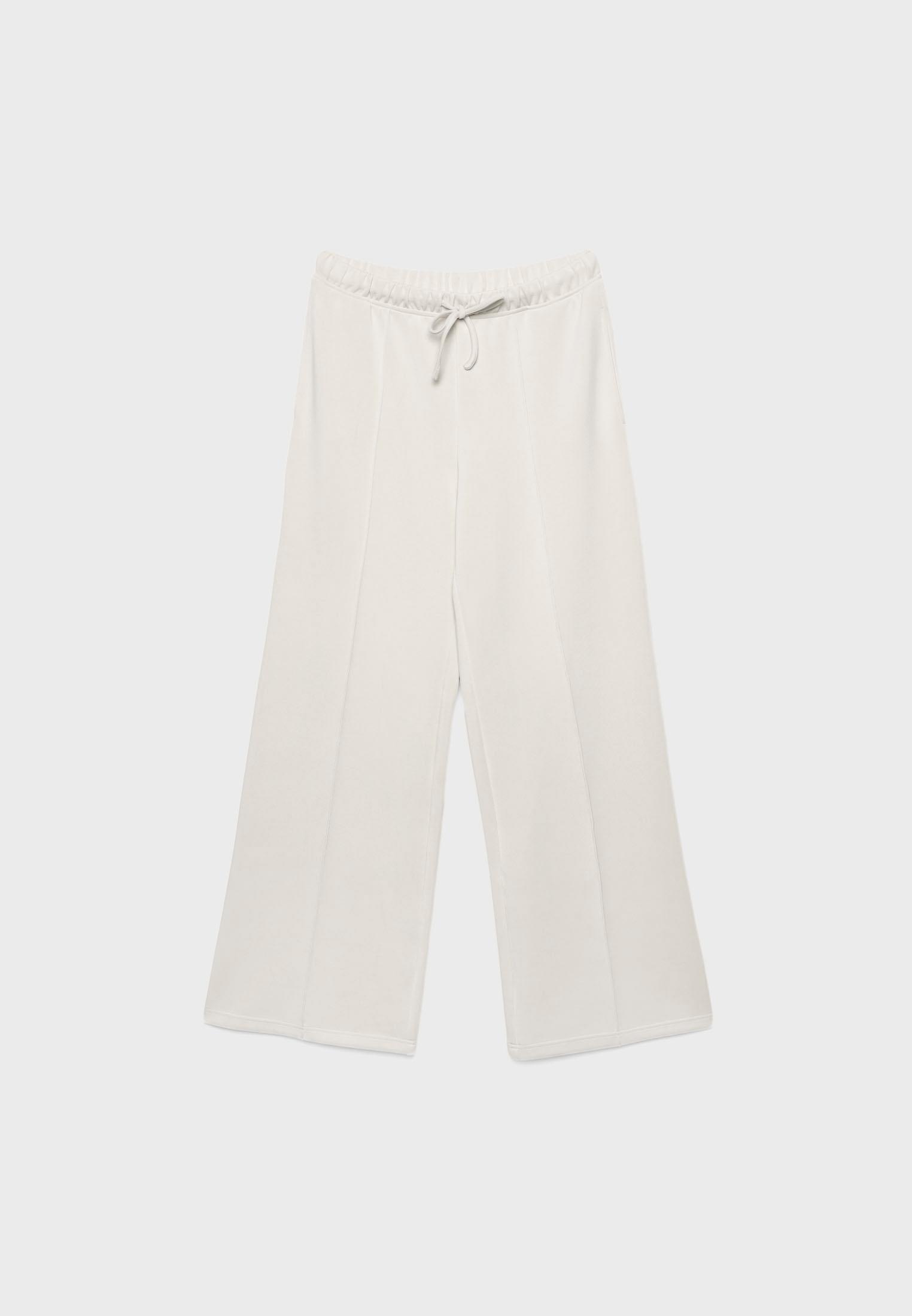 Soft-touch wide-leg pin-tuck joggers — Stone