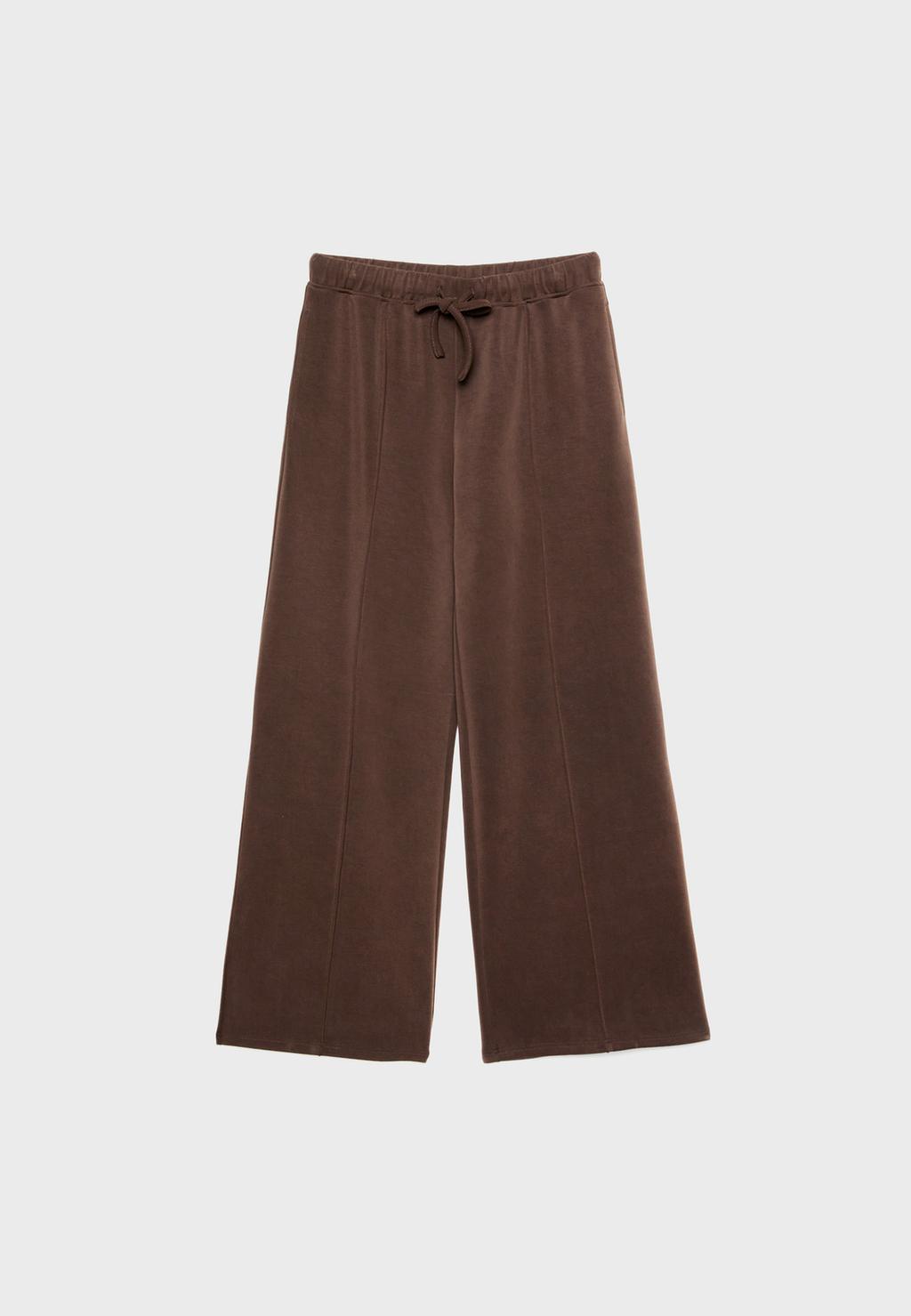 Broek met wijde pijpen en naad van zachte stof