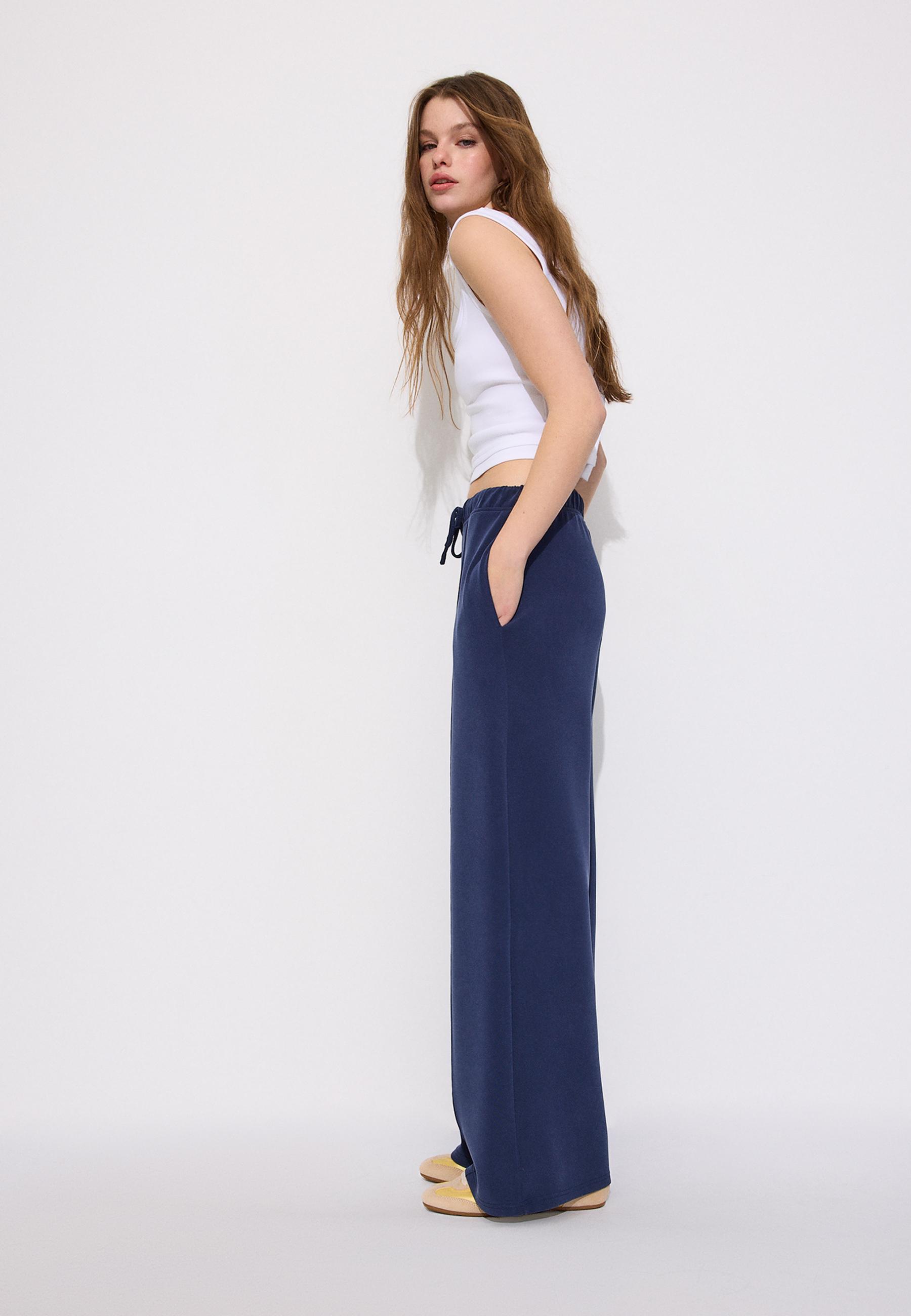 Soft-touch wide-leg pin-tuck joggers — Navy blue
