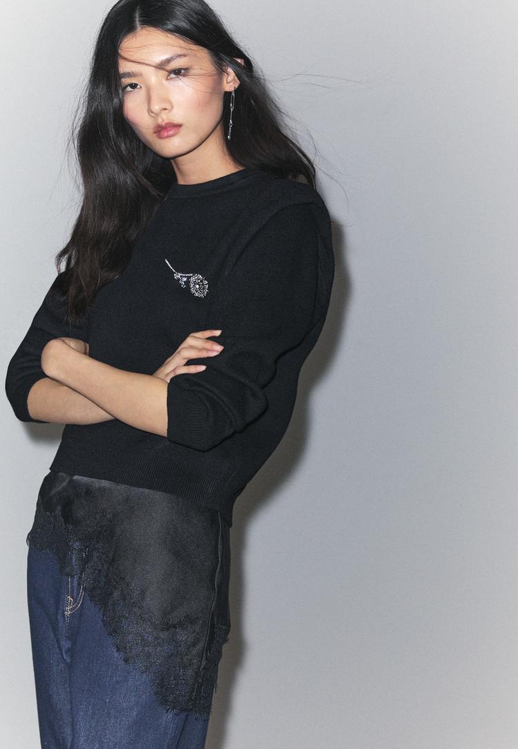 knitted jumper with padded shoulders l05106434