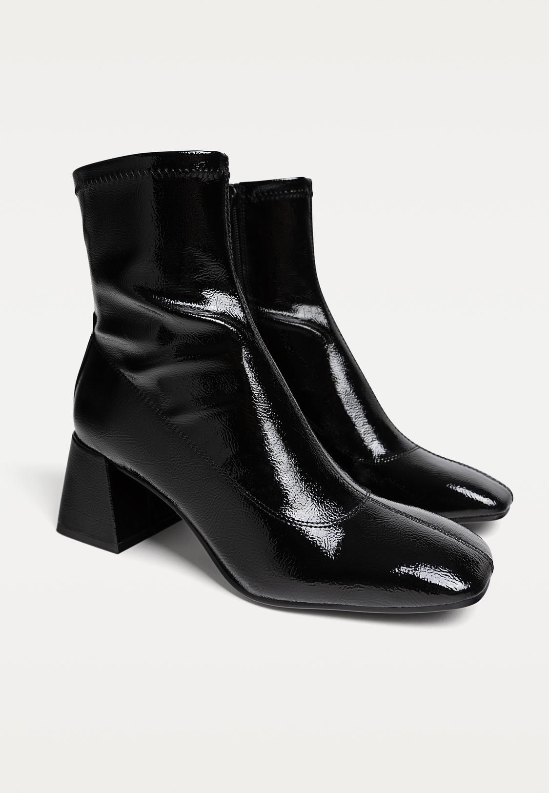 Schwarze Stiefeletten Stradivarius Flache Stiefeletten Mit