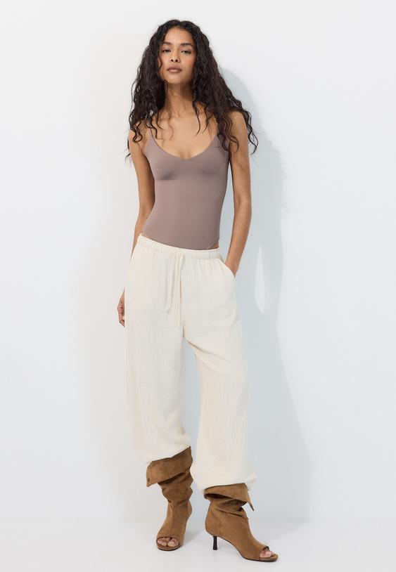 body con spalline e scollo a v