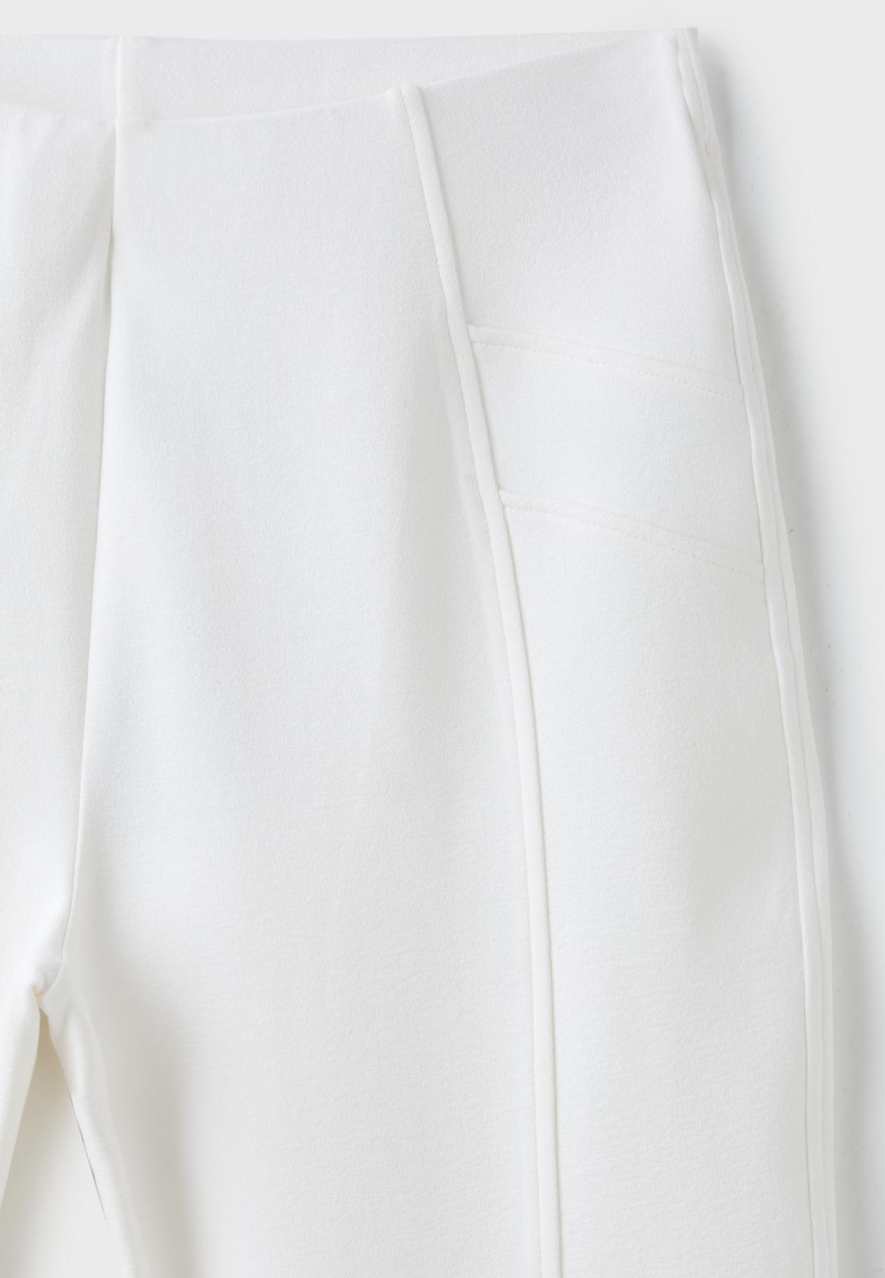 Cotton blend bell bottom leggings with seam detail — Ecru
