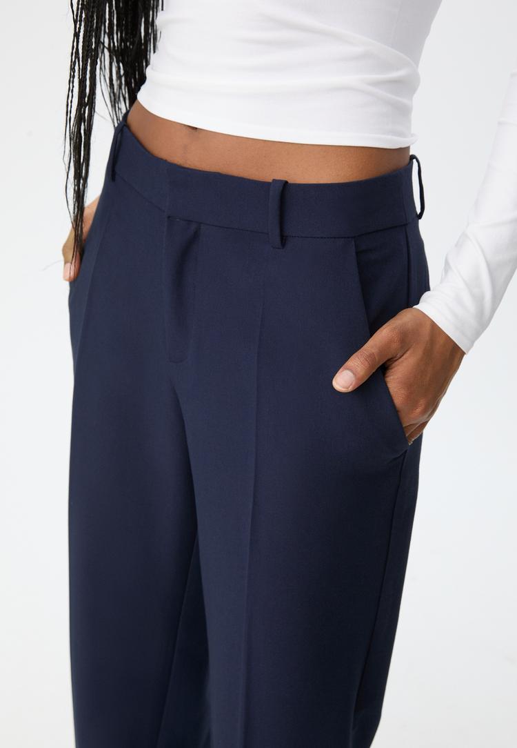 pantalon vestir bolsillos