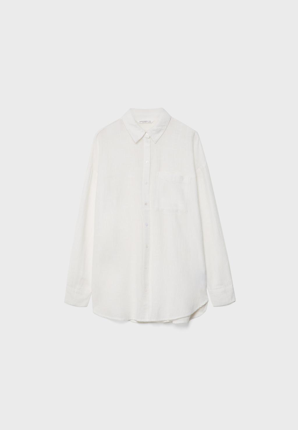 Camisa básica fluida bolsillo