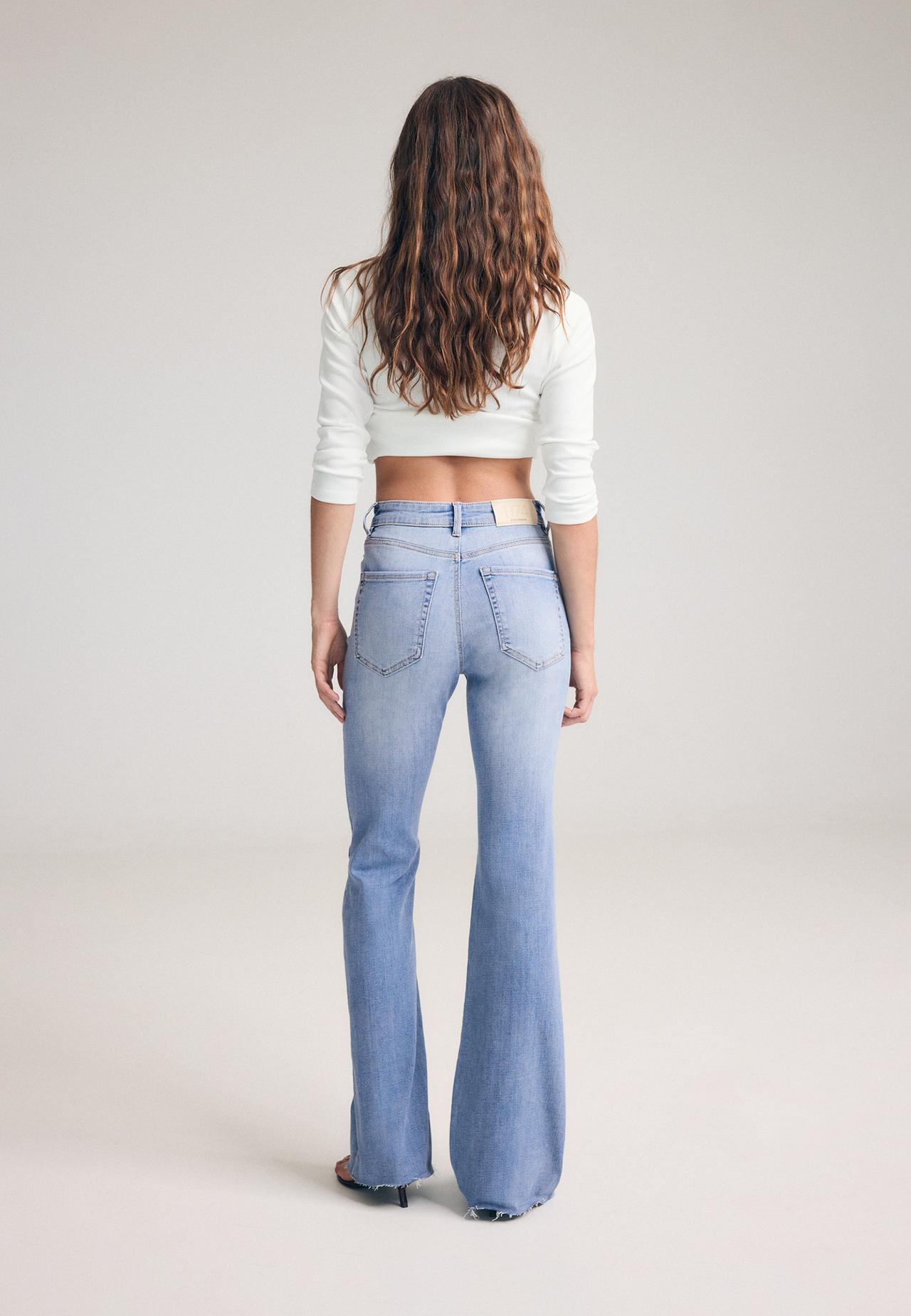 D74 stretch bell bottom jeans with slit — MEDIUM LIGHT BLUE DENIM